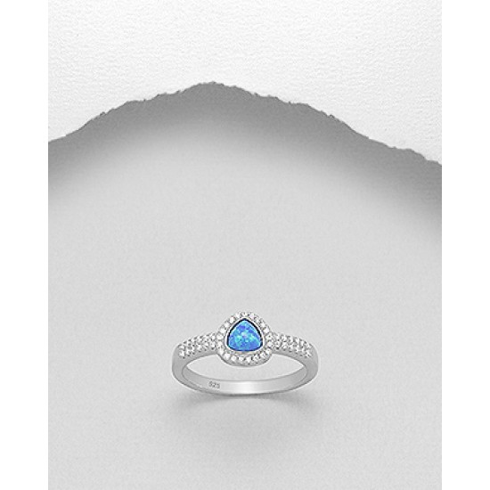 Bague en argent 925 décorée de CZ et d'opale bleu créée en laboratoire